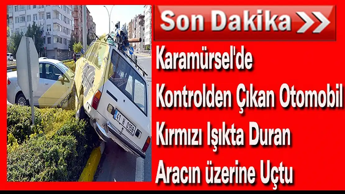 Karamürsel'de kontrolden çıkan otomobil kırmızı ışıkta duran aracın üzerine uçtu