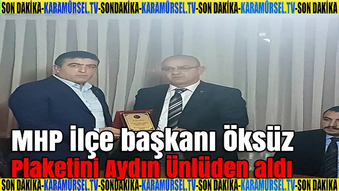 MHP İlçe başkanı Öksüz ve ekibine plaket