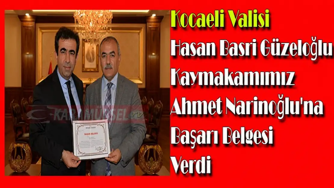 Kocaeli Valisi Hasan Basri Güzeloğlu  Kaymakamımız Ahmet Narinoğlu'na Başarı Belgesi Verdi