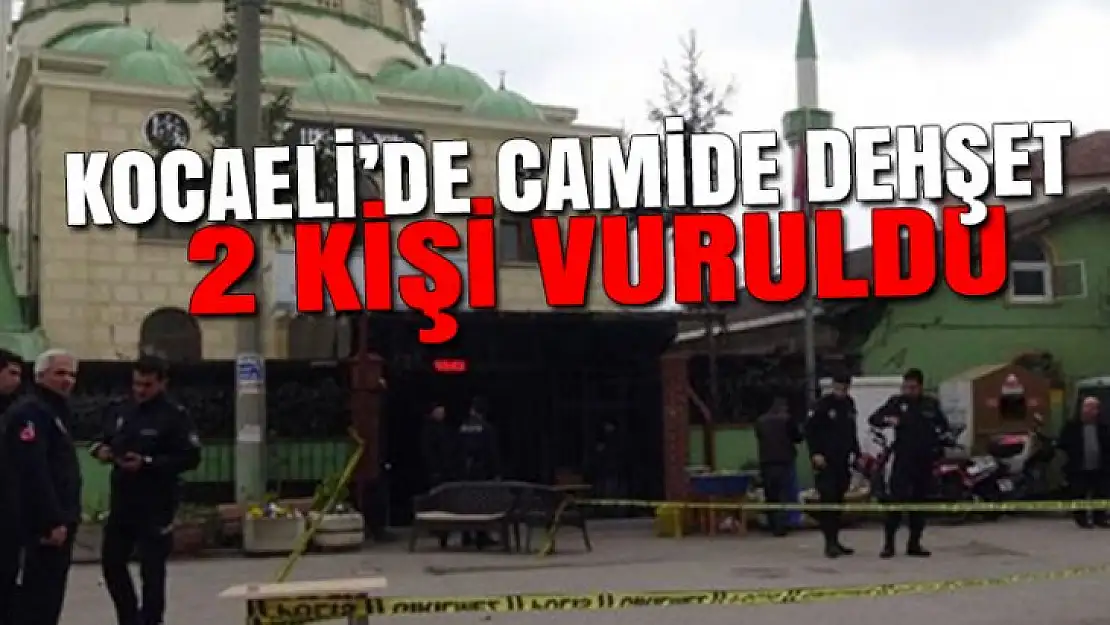 Caminin önünde 2 kişiyi vurdu