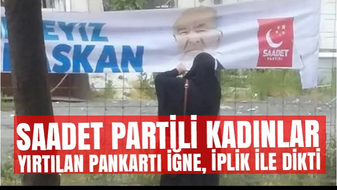 Parçalanan pankartı iğne iplikle dikti